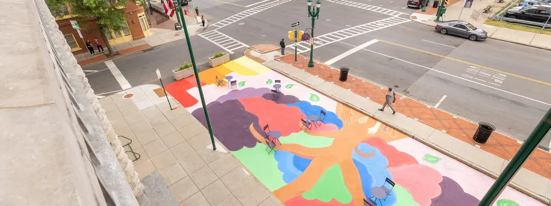 Jessica Whitley Mural in front of city hall in Syracuse.